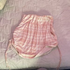 Women’s pink and white plaid skirt